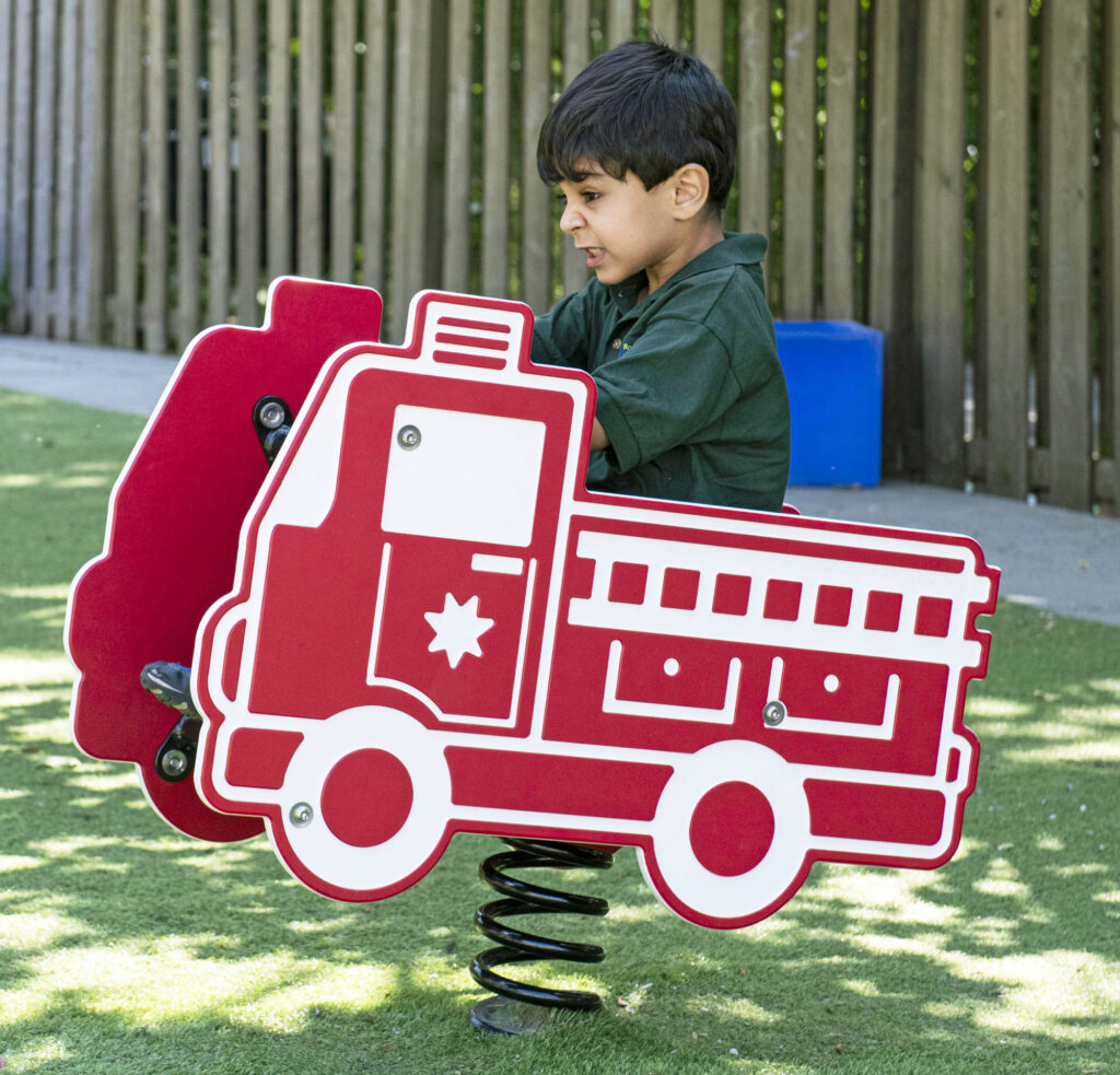 Fire truck rockin rider with boy