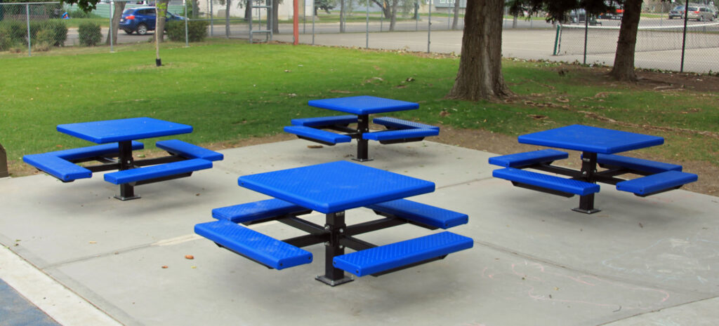 Outdoor classroom with square pedestal tables2.pg